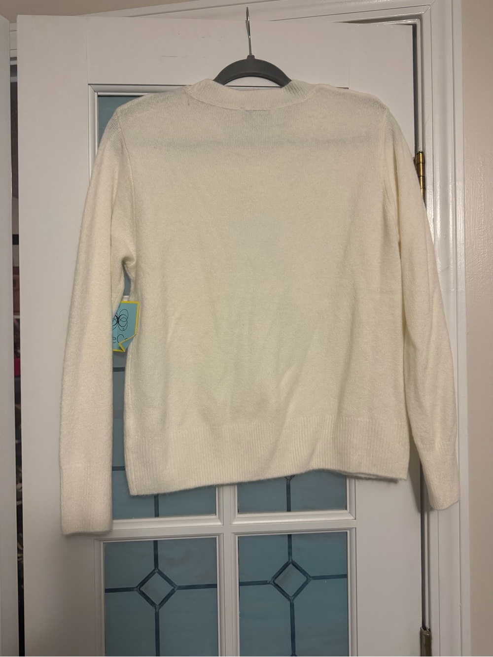 CeCe Cream Crewneck Sweater with Black Bow Accent - Picture 2 of 5